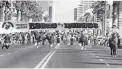  ??  ?? The Phoenix Jaycees Rodeo of Rodeos parade is seen in 1984.