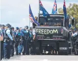  ?? ?? Officers at Parliament House.