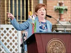  ?? ?? Albany Mayor Kathy Sheehan speaks during the crowning of the Tulip Queen about the background of the Tulip Festival and its importance to the city.