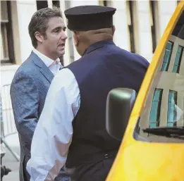  ?? AP PHOTO ?? ‘EVIDENCE’: Michael Cohen, formerly a lawyer for President Trump, leaves his hotel Thursday in New York. A recording of Donald Trump discussing payments to a Playboy model may not create additional problems for the president or Cohen.