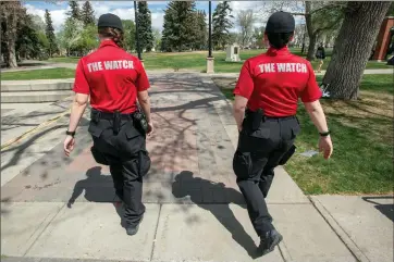  ?? Herald file photo by Ian Martens ?? Members of the Watch program walk through Galt Gardens. Police Chief Shahin Mehdizadeh was before council Monday looking for continuing support for the Watch, Community Peace Officers and Police And Crisis Team programs. @IMartensHe­rald