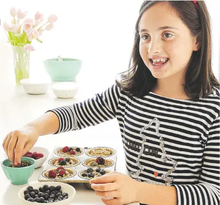  ?? MAYA VISNYEI PHOTOGRAPH­Y ?? Baked Oatmeal Cups. “Honestly, if you throw anything in a muffin pan, they’ll like it,” author Laura Keogh says with a laugh.