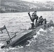  ?? ?? X-craft midget submarine crew train in Loch Striven for the attack on Tirpitz
