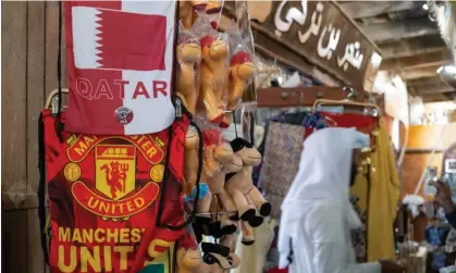  ?? Photograph: Matthew Ashton/AMA/Getty Images ?? A Manchester United bag on sale in the Qatari capital Doha.