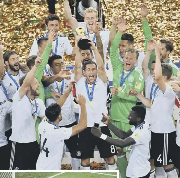  ??  ?? 0 Germany lift the 2017 Confederat­ions Cup, secured after Lars Stindl scored into an empty net 20 minutes into last night’s match against Chile.