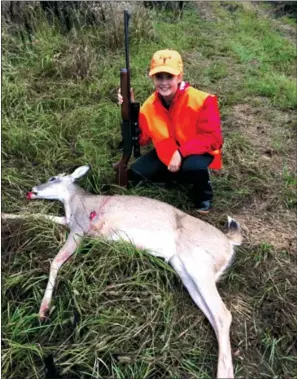  ?? COURTESY OF THE ARKANSAS GAME AND FISH COMMISSION ?? Caleigh Martin, 12, is shown with her first deer. Caleigh, the daughter of David and Crystal Martin, killed the deer in Calhoun County on the opening day of the early youth hunt.