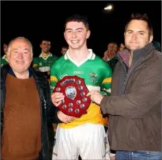  ??  ?? Mark Kehoe, the Hollow Rovers captain, with Noel O’Keeffe of Coiste na nOg and Dean Goodison (People Newspapers).