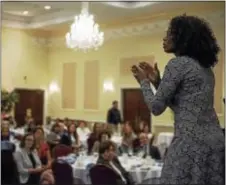  ?? RICK KAUFFMAN — DIGITAL FIRST MEDIA ?? Tonier Cain, right, a survivor of abuse and addiction, offered a keynote address at the Drexelbroo­k on Wednesday for the Office of Behavioral Health awards and banquet.