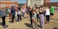  ?? NICHOLAS BUONANNO — DIGITIAL FIRST MEDIA ?? The roof of the Jonsson Rowland Science Center Hirsch Observator­y at Rensselaer Polytechni­c Institute was packed Monday afternoon with people viewing the solar eclipse.