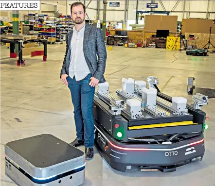  ??  ?? Utopian ideal: Ryan Gariepy, above, of Clearpath Robotics, with his Otto Robots in Kitchener, Ontario. In the future, intelligen­t robots, below, will take on more tasks currently performed by humans