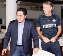  ?? GETTY ?? Erick Thohir, 45 anni, presidente dell’Inter. Qui con Roberto Mancini, tecnico dei nerazzurri