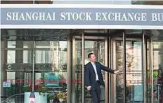  ?? Rex Features ?? The Shanghai Stock Exchange. MSCI said last year that it will reconsider adding Chinese domestic shares in its 2017 review.