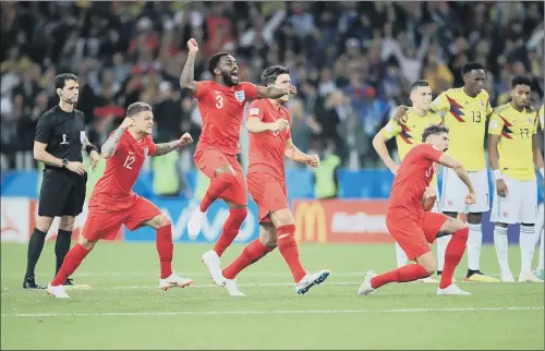  ?? PICTURE: ADAM DAVY/PA WIRE ?? FOUR-THREE: England quartet, l-r, Kieran Trippier, Danny Rose, Harry Maguire and John Stones celebrate the penalty shoot-out win as three Colombians look on.