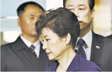  ??  ?? Acusada. La Fiscalía de Corea del Sur acusó a la encarcelad­a expresiden­ta del país, Park Geun-hye, de soborno, extorsión, abuso de poder y otros cargos de corrupción.