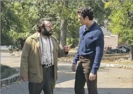  ?? Nicole Wilder Paramount+ ?? DAN FOGLER, left, portrays filmmaker Francis Ford Coppola and Miles Teller is producer Albert S. Ruddy in “The Offer,” a limited series about “The Godfather.”