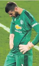  ??  ?? David de Gea during United’s defeat by Liverpool at Anfield