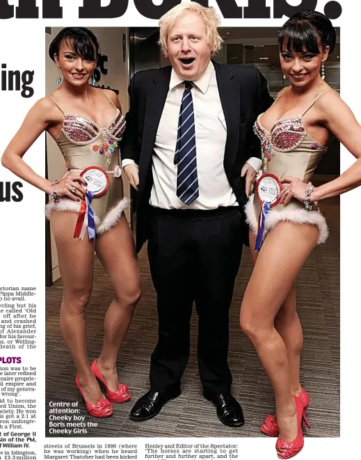  ??  ?? Centre of attention: Cheeky boy Boris meets the Cheeky Girls