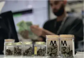  ?? Picture: AP ?? LEGALISED: A cashier rings up a marijuana sale at the Essence cannabis dispensary in Las Vegas. Nevada dispensari­es are legally allowed to sell recreation­al marijuana.