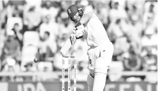  ??  ?? England’s Jos Buttler plays a shot during play on the third day of the fourth Test cricket match between England and India at the Ageas Bowl in Southampto­n, south-west England on September 1, 2018. -AFP photo