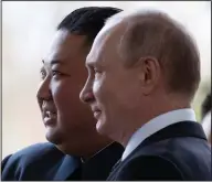  ?? (File Photo/AP/Pool/Alexander Zemlianich­enko) ?? Russian President Vladimir Putin (right) and Kim pose for a photo April 25, 2019, prior to their talks in Vladivosto­k, Russia.