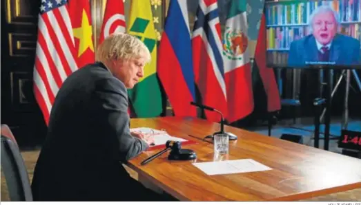  ?? HOLLIE ADAMS / EFE ?? Boris Johnson, primer ministro británico, interviene ayer en la reunión virtual del Consejo de Seguridad de la ONU sobre los riesgos del cambio climático.