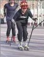  ?? ?? Roller skiing is an increasing­ly popular summer sport, and can help people hone their skills before they take to the slopes in winter.