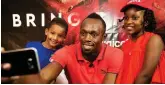  ??  ?? Finishingl­ine: Digicel, whose ambassador is Usain Bolt, is on way to a bond deal