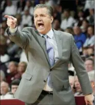  ?? ROGELIO V. SOLIS — THE ASSOCIATED PRESS ?? Kentucky head coach John Calipari calls out to his team during the second half of an NCAA basketball game against Mississipp­i State in Starkville, Miss., Saturday. Kentucky won 71-67.