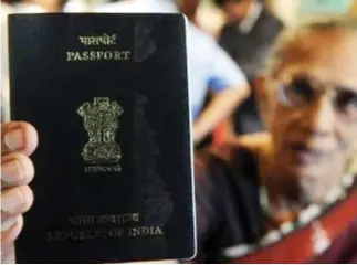  ??  ?? India plans to issue orange-covered passports to some migrant workers, not the regular blue passport, pictured above. (AFP)