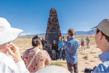  ?? ?? Tourists visit the Trinity Site obelisk, which marks ground zero at White Sands Missile Range in New Mexico. JOHN BURCHAM/THE NEW YORK TIMES PHOTOS 2022