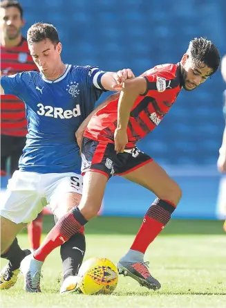  ?? Picture: SNS Group. ?? Left: Dundee’s Cammy Kerr and Scott Bain can do nothing to prevent Josh Windass making it 2-0; above: Dark Blues scorer Faissal El Bakhtaoui battles with Rangers captain Lee Wallace.