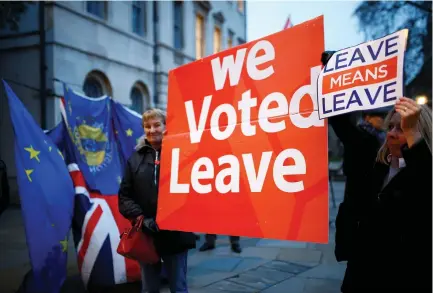  ?? (Reuters) ?? ACTIVISTS WHO supported leaving the EU demonstrat­e in London.