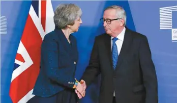  ?? ARIS OIKONOMOU AGENCE FRANCE-PRESSE ?? Theresa May a rencontré jeudi le président de la Commission européenne, Jean-Claude Juncker.