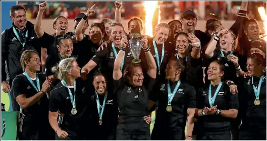  ?? GETTY IMAGES, MONIQUE FORD/FAIRFAX NZ ?? Clockwise from main: the Black Ferns celebrate their World Cup win in Belfast last month; Hayley Holt has carved out a successful career in the media but constantly feels the pressure to ‘overperfor­m’ compared to her male colleagues; former Black Fern Melodie Robinson, far left, knows what it is like to operate in an industry dominated by men and has set up a network to support and foster female talent in the media.