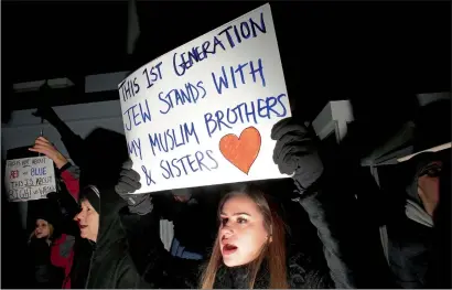  ?? — AFP ?? Demonstrat­ors protest President Trump’s executive immigratio­n ban at O’Hare Internatio­nal Airport in Chicago, Illinois.