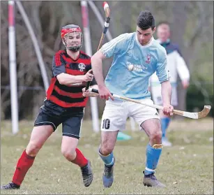  ?? Photograph: Stephen Lawson. ?? Oban Camanachd’s Daniel MacVicar and Blair Morrison from Caberfeidh in action during last Saturday’s premiershi­p match at Castle Leod.