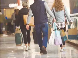  ?? (Mark Makela/Reuters) ?? PEOPLE SHOP at the King of Prussia Mall in King of Prussia, Pennsylvan­ia.