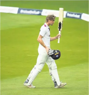  ?? PICTURE: Harry Trump/getty Images ?? Tom Lammonby lifts his bat after his century on day four of the Bob Willis Trophy final