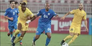  ??  ?? Saad Naseeb Al Khayarin of Al khariatiya­t (centre) is challenged by Jonathan Kodija of Gharafa during their Ooredoo Cup Group B match at the Al Duhail Stadium on Wednesday. Al Gharafa won 3-1.