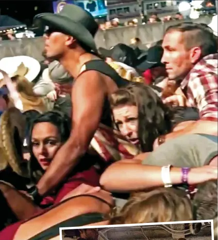  ??  ?? Panic: Concert-goers are crushed together as they try to flee the carnage