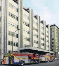  ?? PHOTOS: STEPHEN JAQUIERY ?? Emergency call . . . Fire appliances outside Dunedin Hospital yesterday morning after a contractor’s arm was seriously injured.