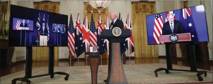  ??  ?? Sub deal… US president Joe Biden, Britain’s prime minister Boris Johnson and his Australian counterpar­t Scott Morrison announced the new defence pact on Wednesday evening.
