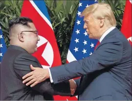  ?? Evan Vucci Associated Press ?? PRESIDENT TRUMP and Kim Jong Un in Singapore. “He speaks and his people sit up at attention. I want my people to do the same,” Trump said of Kim.