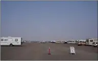  ??  ?? The airport site still has RVs and trailers. The site, opened on June 25, has been a frequent topic as the city faces litigation pausing anti-camping ordinances.