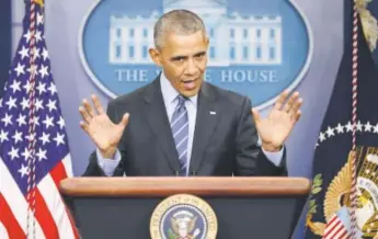  ??  ?? President Barack Obama answers questions during a news conference at the White House on Friday, prior to leaving for his annual family vacation in Hawaii. Chip Somodevill­a, Getty Images