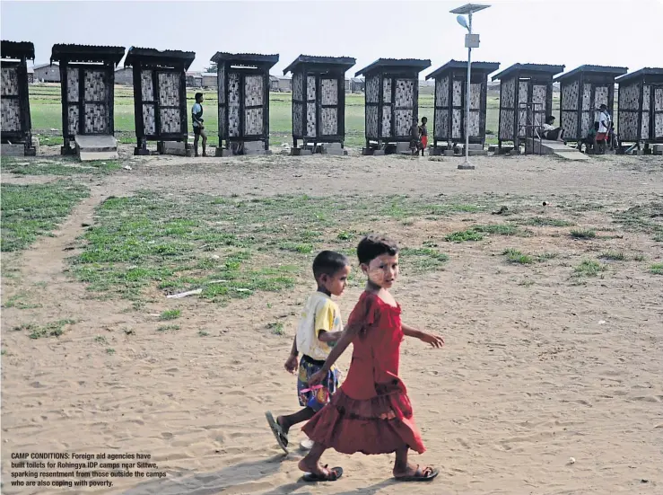  ??  ?? CAMP CONDITIONS: Foreign aid agencies have built toilets for Rohingya IDP camps near Sittwe, sparking resentment from those outside the camps who are also coping with poverty.