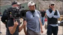  ??  ?? Director Rod Lurie (center) on the set of “The Outpost,” which was actually filmed in Bulgaria for logistical reasons.
