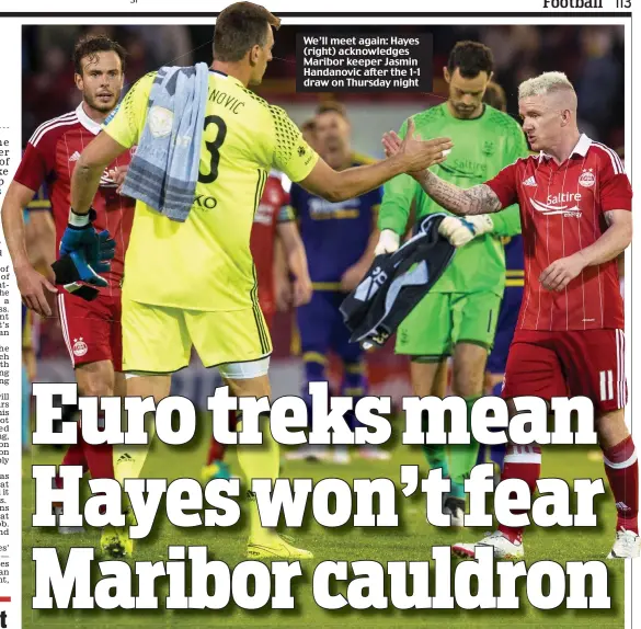  ??  ?? We’ll meet again: Hayes (right) acknowledg­es Maribor keeper Jasmin Handanovic after the 1-1 draw on Thursday night