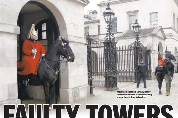  ??  ?? Mounted Household Cavalry nearly outnumber visitors at what is usually a huge tourist draw in London.