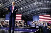  ?? TOM BRENNER / THE NEW YORK TIMES ?? President Donald Trump speaks at a campaignst­yle rally in Washington Township, Mich., on Saturday, again forgoing the annual White House Correspond­ents’ Dinner.